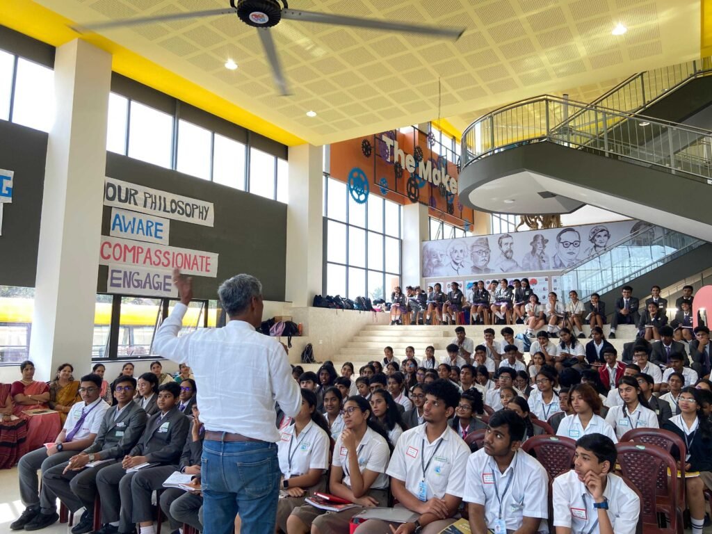 best rated schools in bangalore ekya nava students sitting inside thr campus