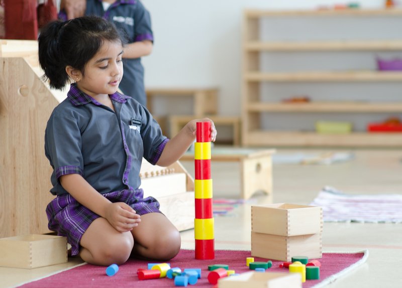 igcse schools in bangalore ekya nava student playing inside the classroom